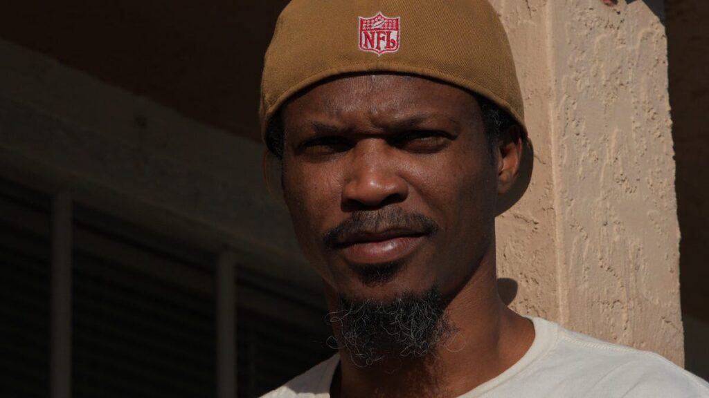 Travis hunter's father back in custody for house arrest violation