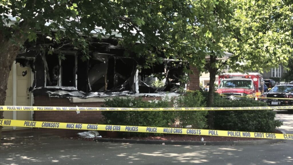 Damaged Florida home after drive-by shooting incident.