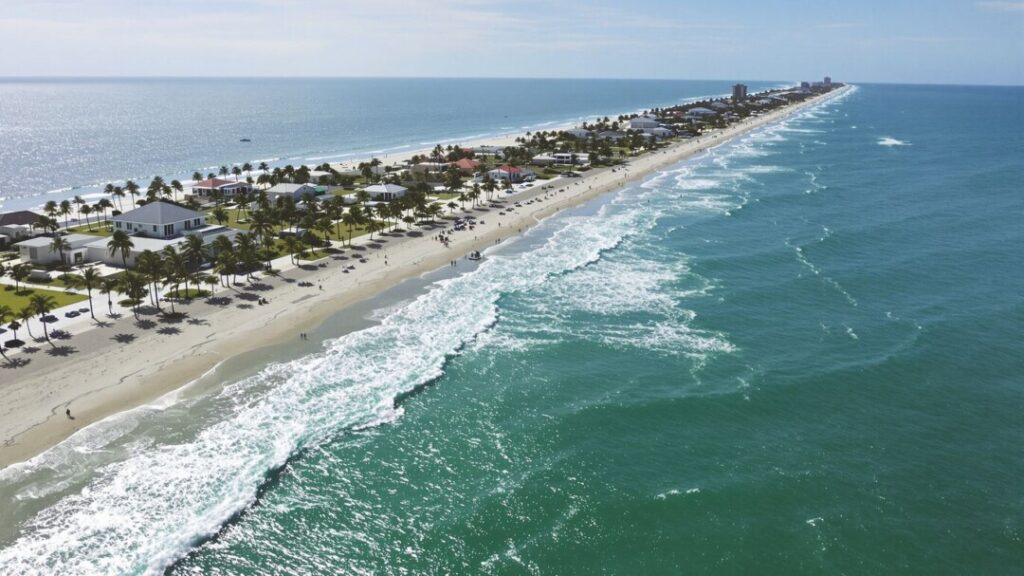 Florida coast with a house and ocean.