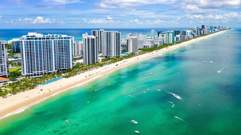 Florida coastline with modern buildings, beaches, and ocean.