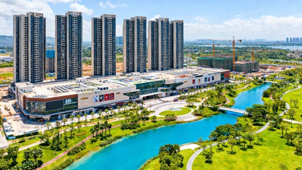 South Florida cityscape with new condos and mall redevelopment.