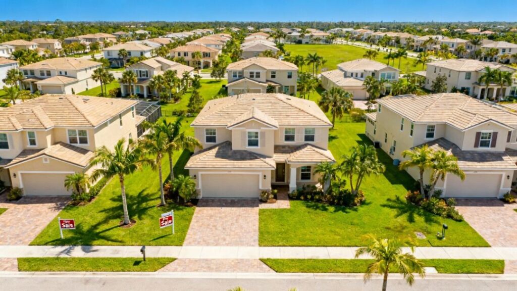 Florida neighborhood with homes for sale and palm trees