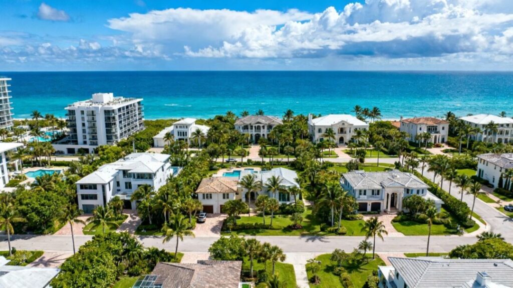 Sunny aerial view of Palm Beach luxury real estate