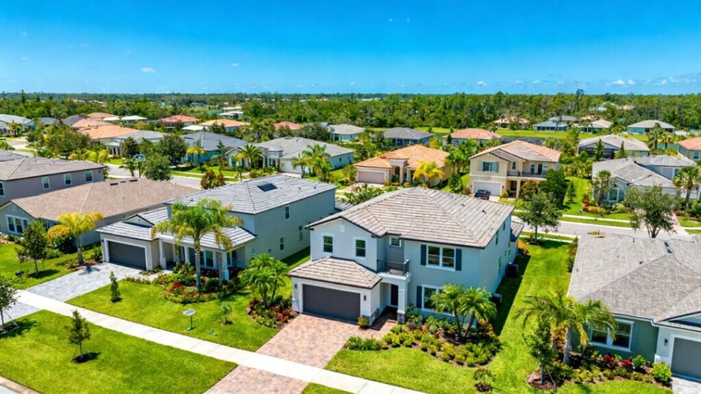 Central Florida homes under a bright blue sky.
