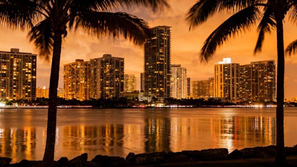 Miami skyline with apartment buildings at dusk.
