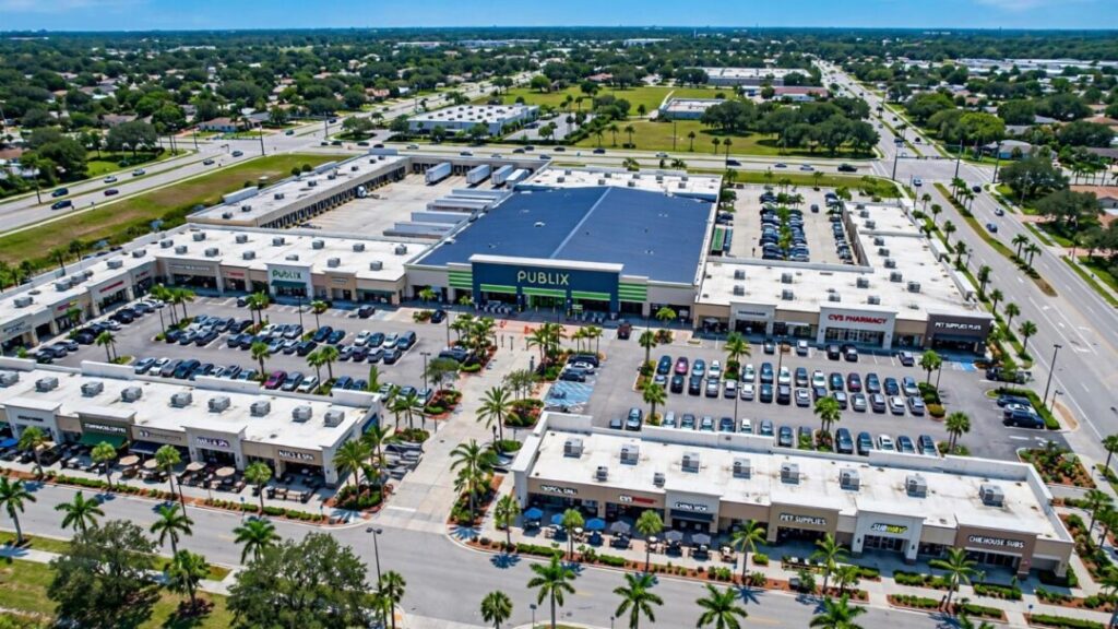 Aerial view of a grocery-anchored shopping plaza in Largo