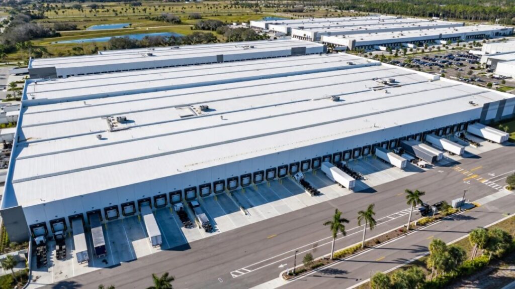 Modern Central Florida warehouse with loading bays and parked trailers