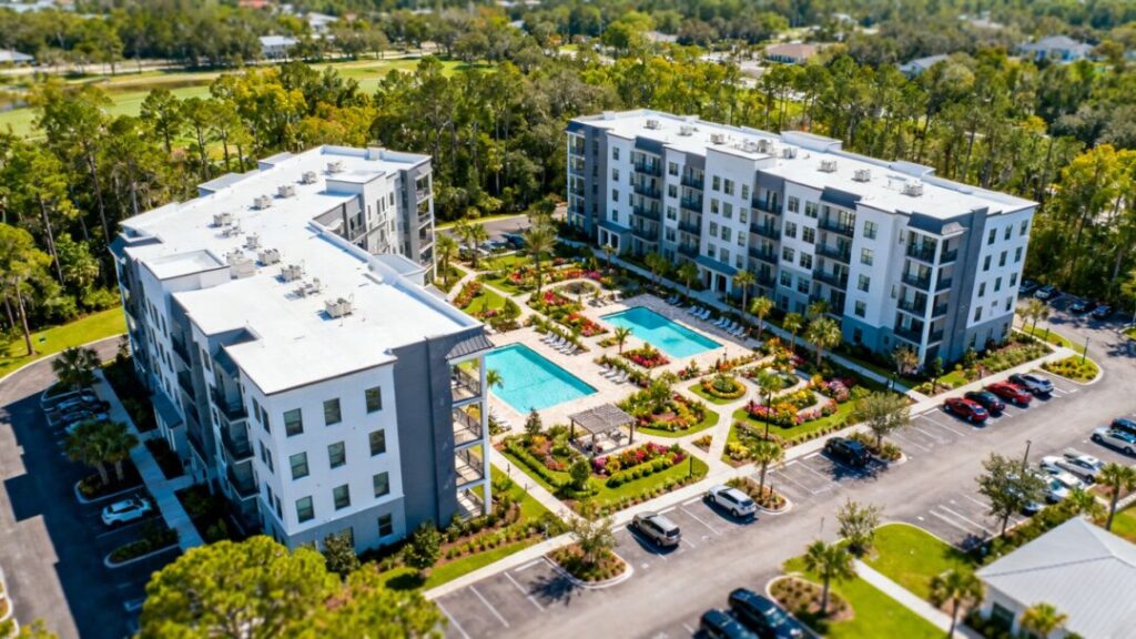 Two North Florida apartment communities amid lush landscaping and sunny skies.